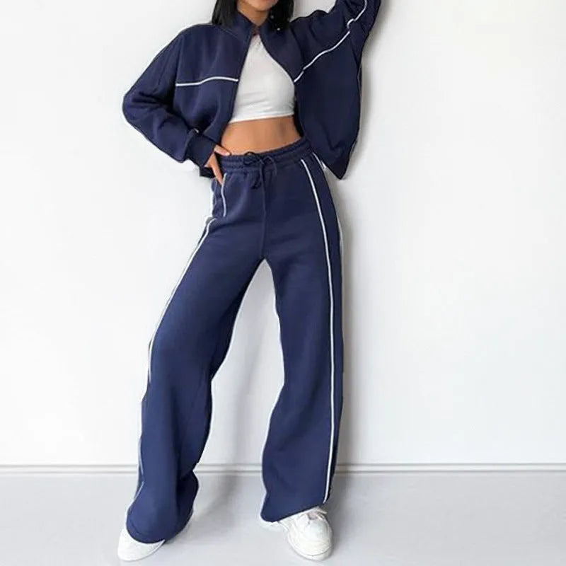 Casual polyester suit set showing a mock neck zip hoodie and matching striped trousers with lace-up detail.