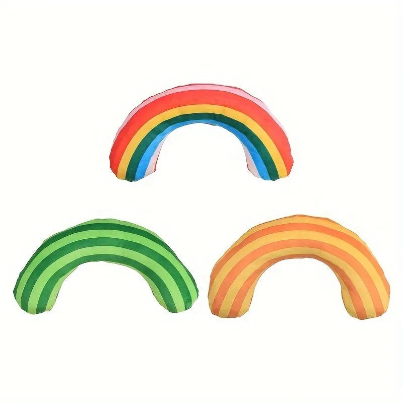 Green, rainbow, and yellow cat toy set with noise-maker, catnip, and a striped pillow measuring 23 by 20 cm.