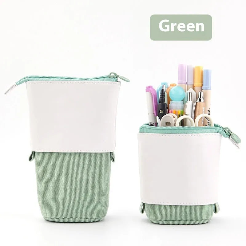 Corduroy drop-down telescopic stationery case in six colour options on a desk