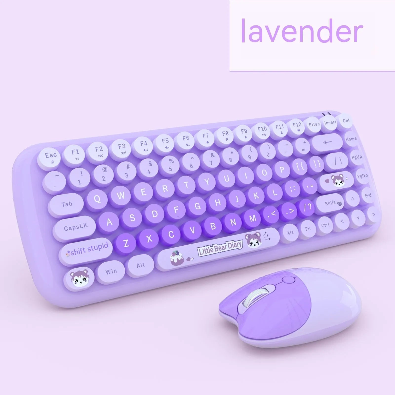 Pink mini wireless keyboard and mouse set with compact design on a desk
