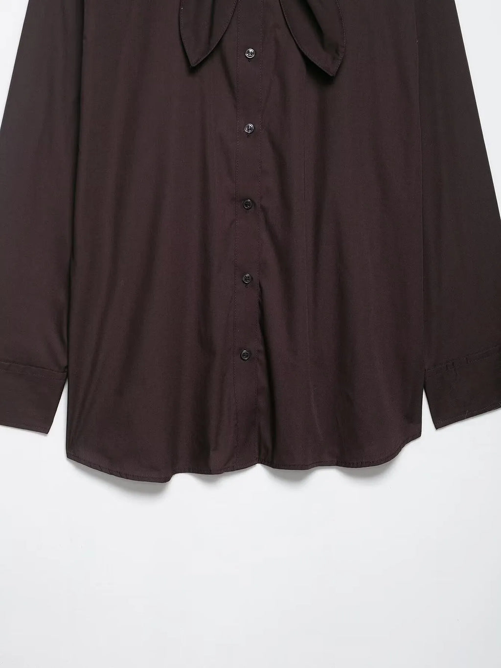 Brown women's poplin shirt with a bow tie, cardigan-style front, and long sleeves.