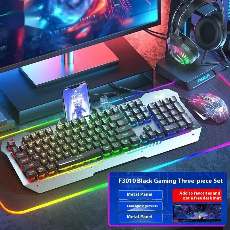 Metal mechanical keyboard bundle with gaming mouse, headset, and optional mouse pad on a desk.
