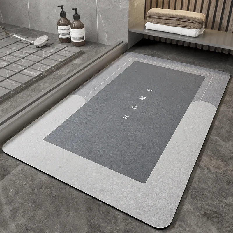 Blended fabric floor mat in an oval shape on a bathroom floor, available in multiple colours and sizes.