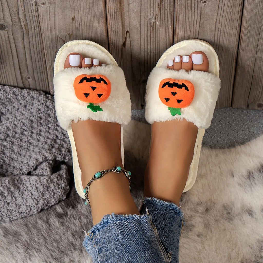 Pumpkin-themed plush slippers with synthetic fur upper and anti-slip PVC sole
