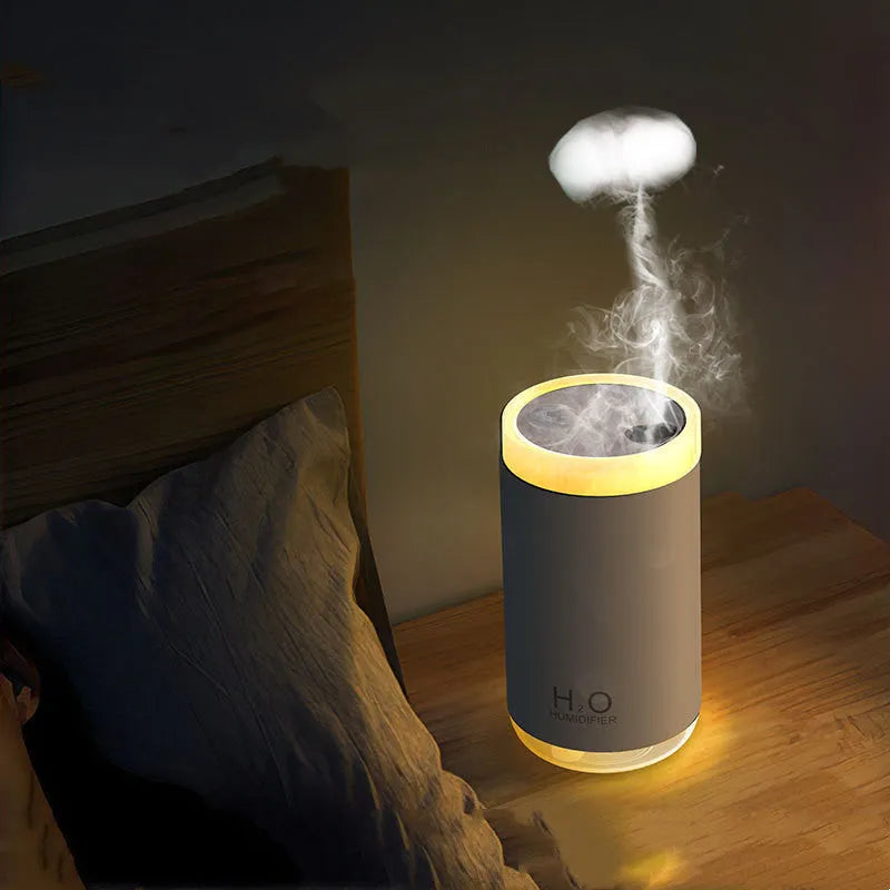 Jellyfish-shaped USB humidifier diffuser with warm night light in white pink or blue colour options