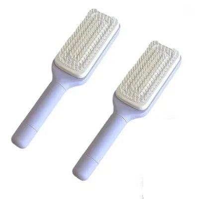 Self-cleaning hair brush with rotating handle, anti-static teeth and scalp massage points in purple and grey colours