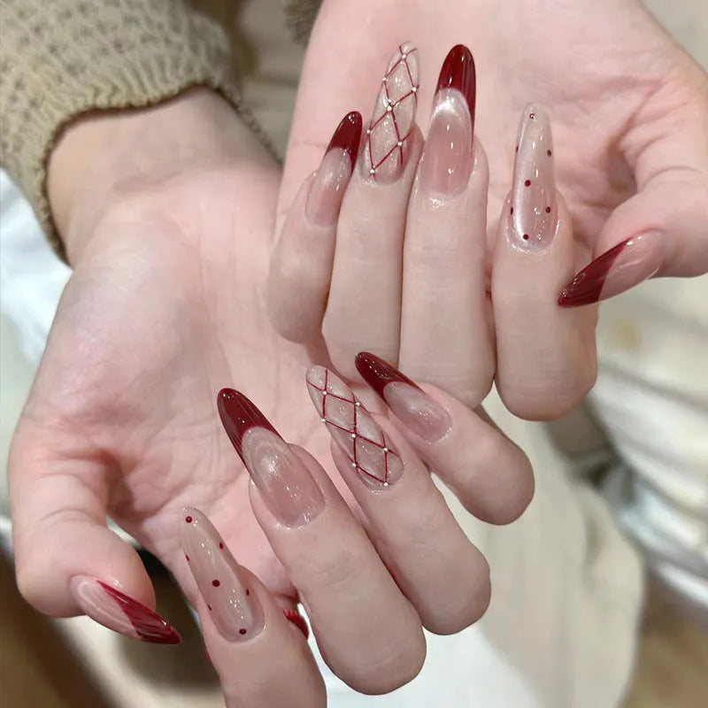 False nails sets for girls showing floral and glitter designs on short oval and stiletto nail shapes