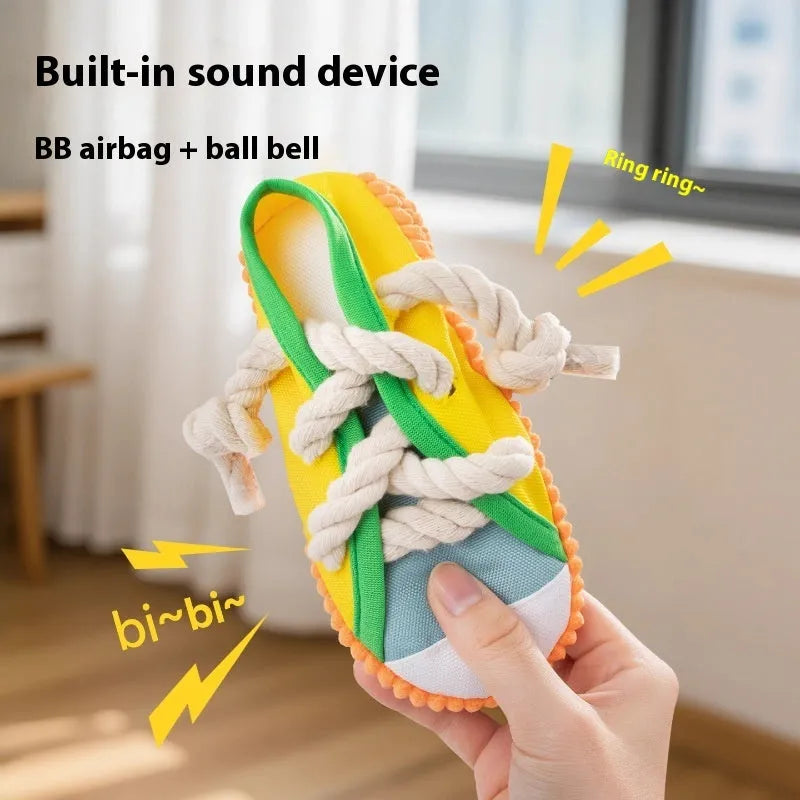 Plastic slipper-shaped dog chew toy in yellow colour for teething relief