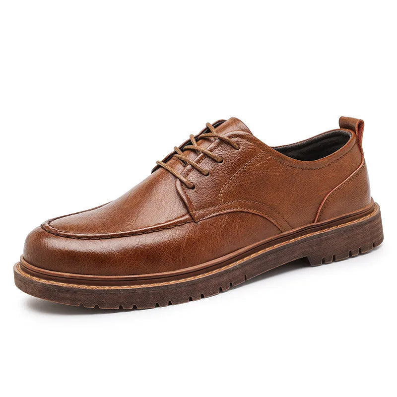 Men's brown casual leather slip-on shoes with round toe and flat rubber sole