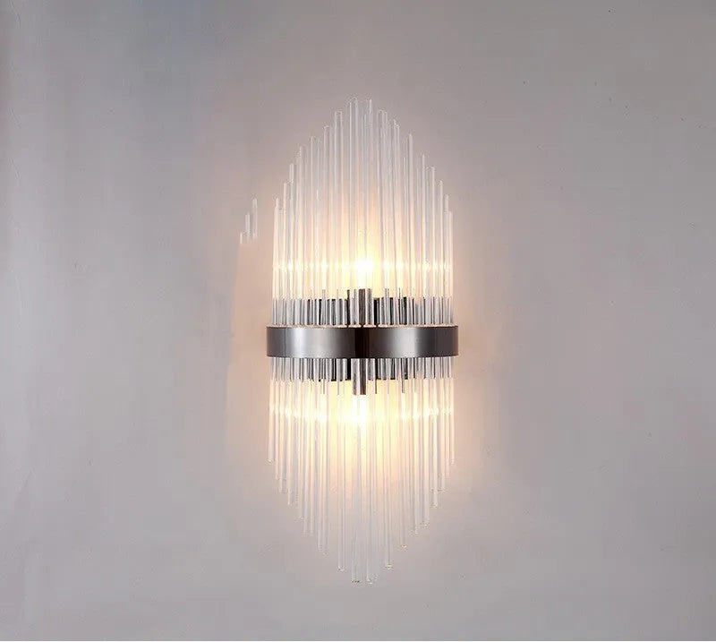 Modern petal-shaped crystal wall lamp with titanium finish in living room setting