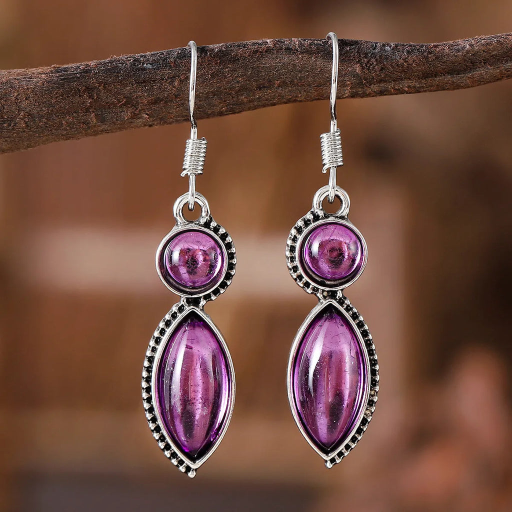 A pair of black and purple geometric vintage pendant earrings with a round detail, made from zinc alloy.