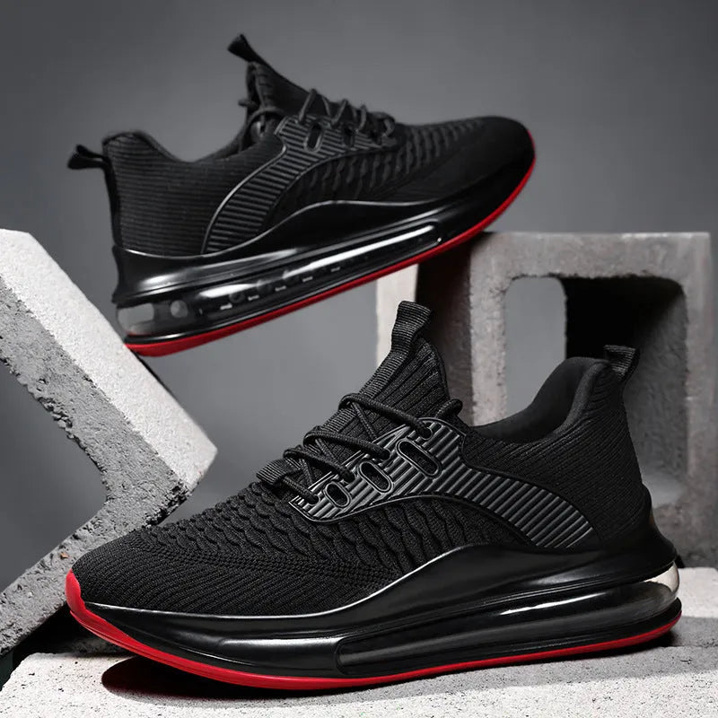 Men's black low-top mesh running sneakers with lace-up front and platform sole