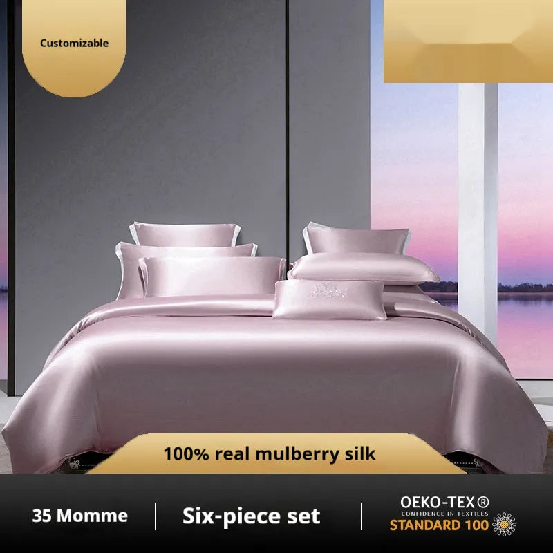 Silk four-piece quilt cover set in solid colour with fitted or flat sheet options for UK bed sizes.