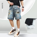 Blue ripped men's denim shorts with graffiti detail and a straight leg.