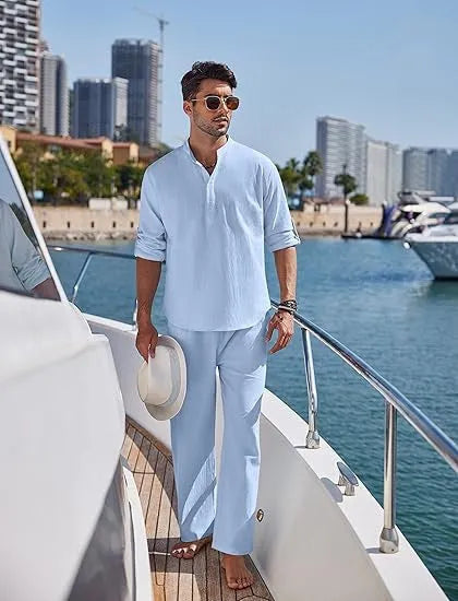 Men's casual cotton suit set in a solid colour, featuring a long-sleeved top and matching trousers.