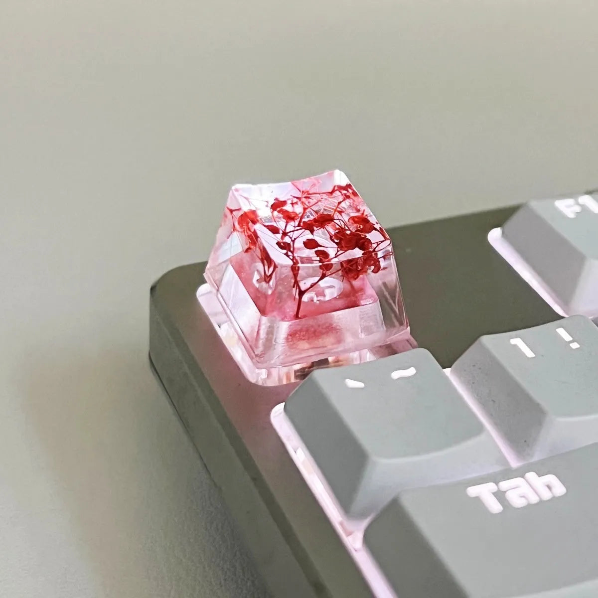 Single resin mechanical keyboard keycap with high transparency and embedded starry sky design, shown in violet colour.