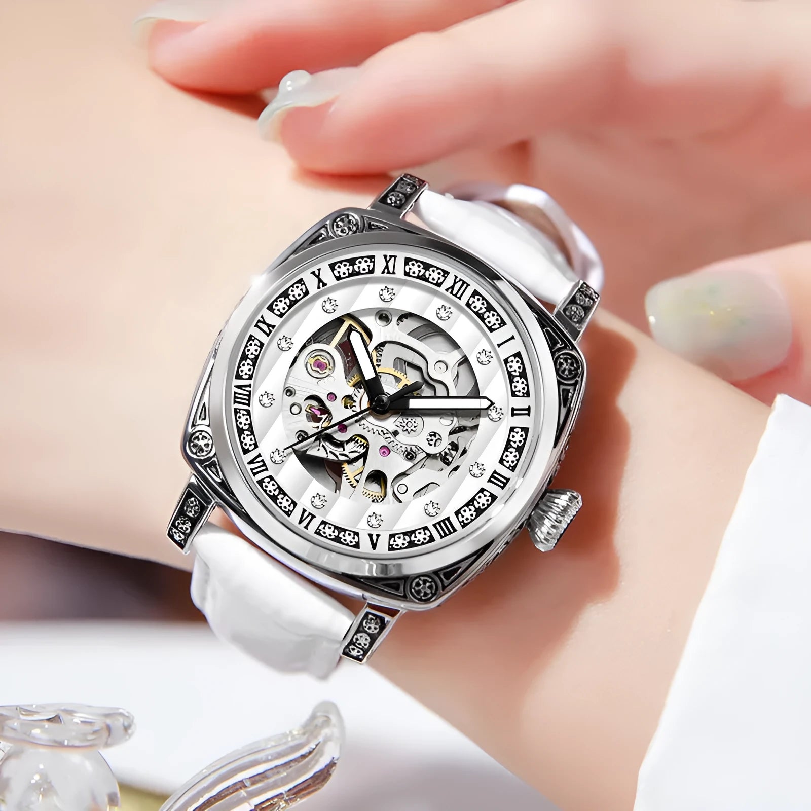 Mechanical watch with luminous hands on leather belt showing 10m waterproof rating and available colour options