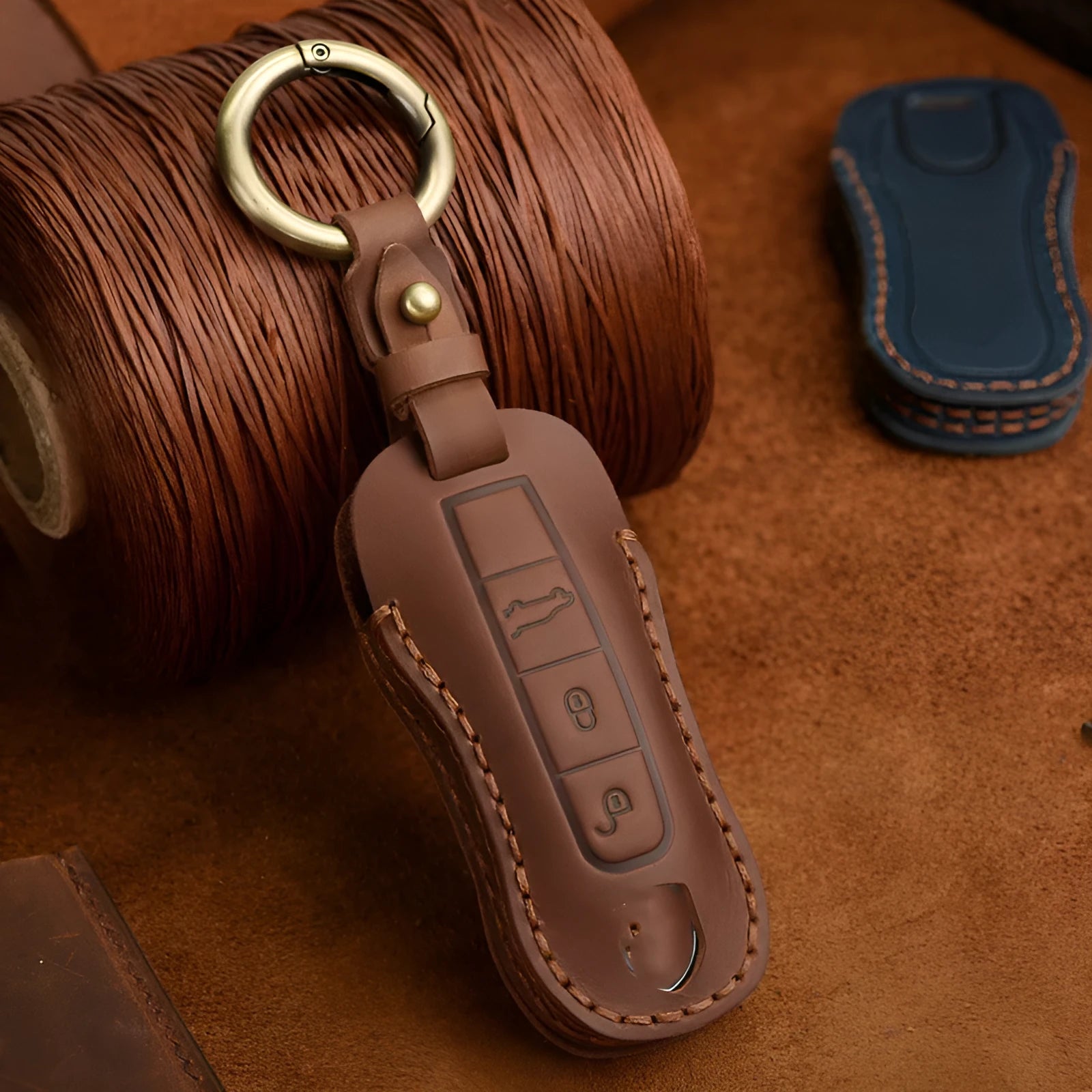 Porsche leather key case with retro bag buckle in blue or brown colour