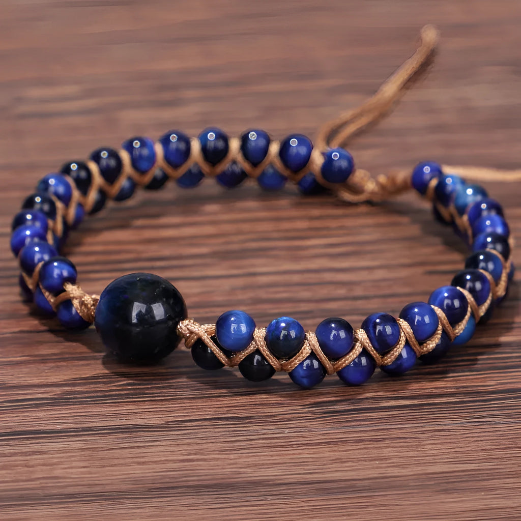Handmade woven bracelet with geometric pattern in blue tigereye or amethyst stone beads