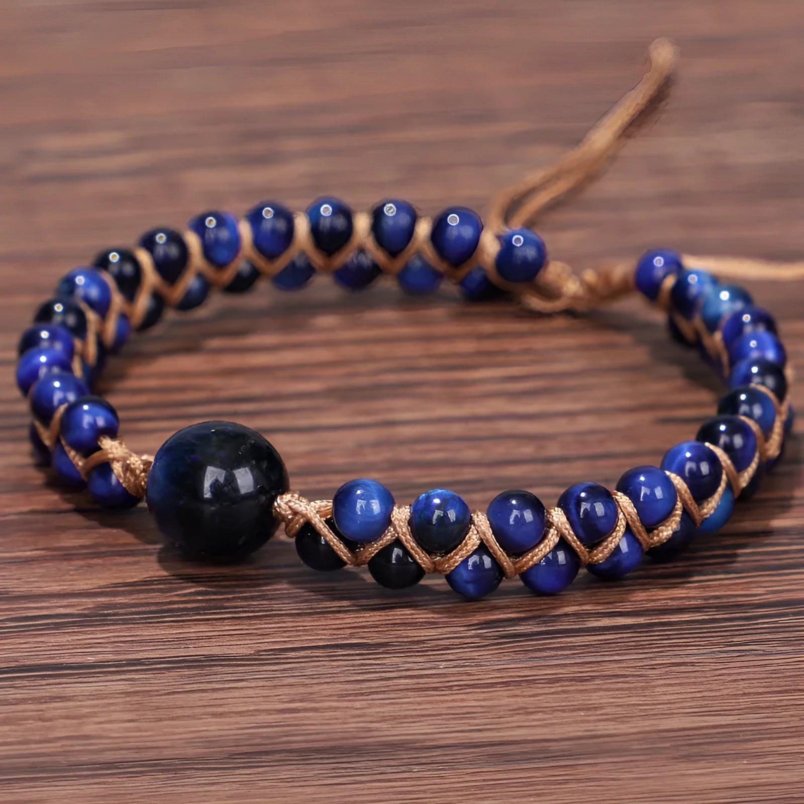 Handmade woven bracelet with geometric pattern in blue tigereye or amethyst stone beads