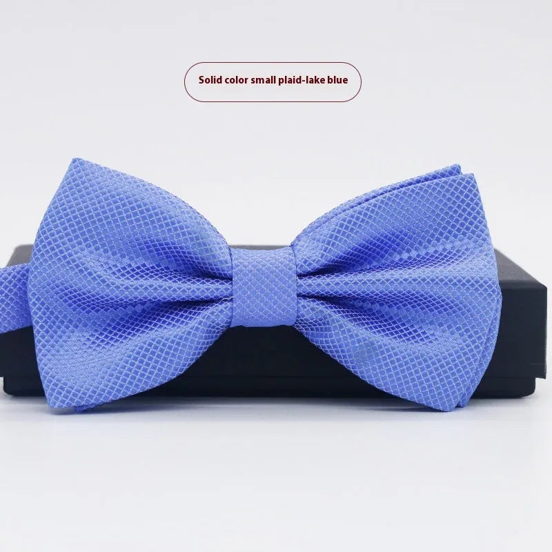 Men's flat head solid colour bow tie in polyester, showing 12cm by 6cm size on a background.