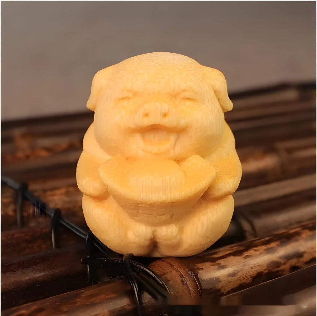 Solid bamboo carving ornament of a Fu Lu pig ingot, 4cm tall.