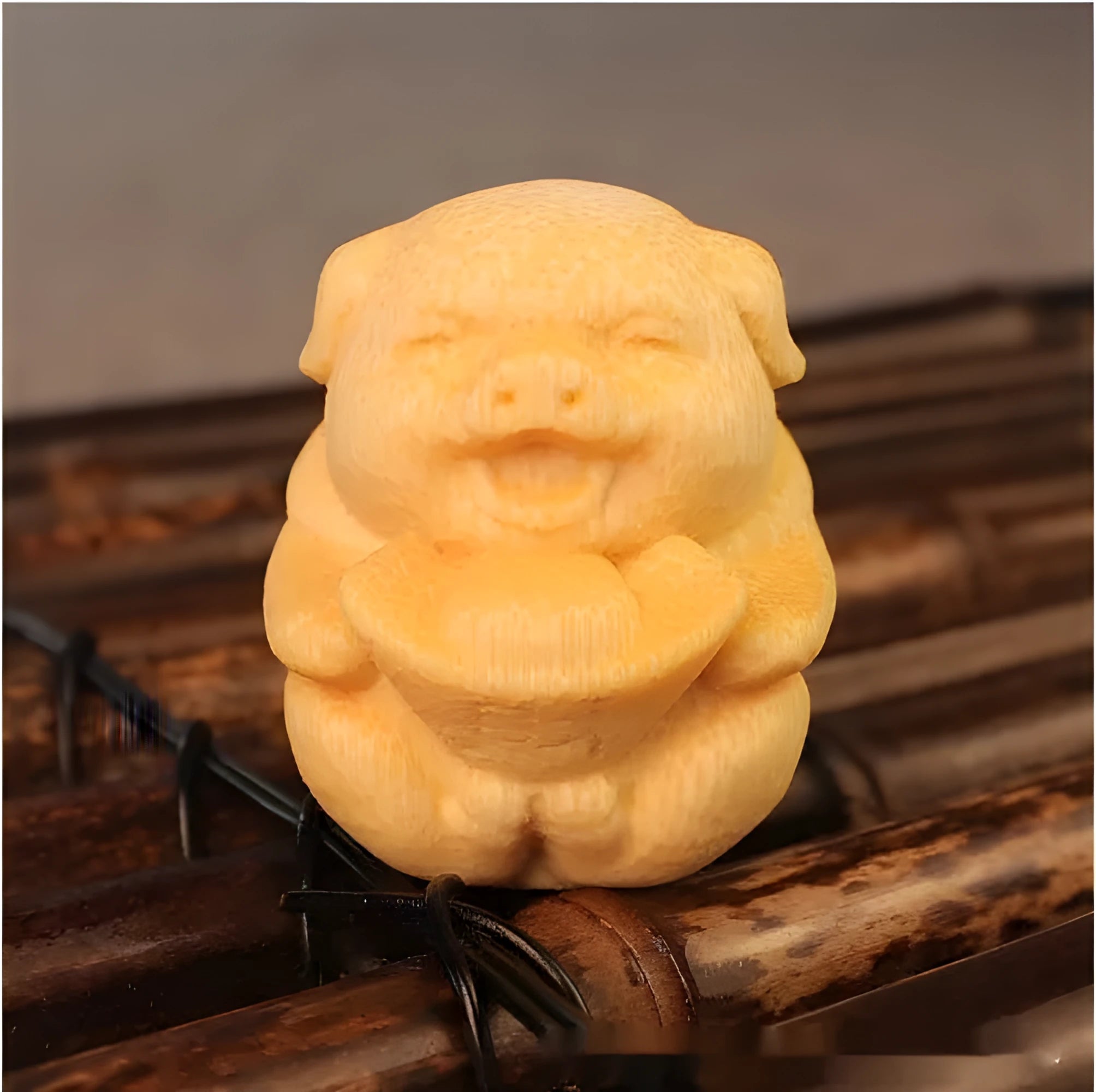 Solid bamboo carving ornament of a Fu Lu pig ingot, 4cm tall.