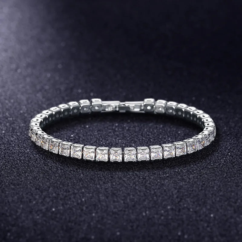Electroplated real platinum women's bracelet with square diamond geometric design and gang drill details.