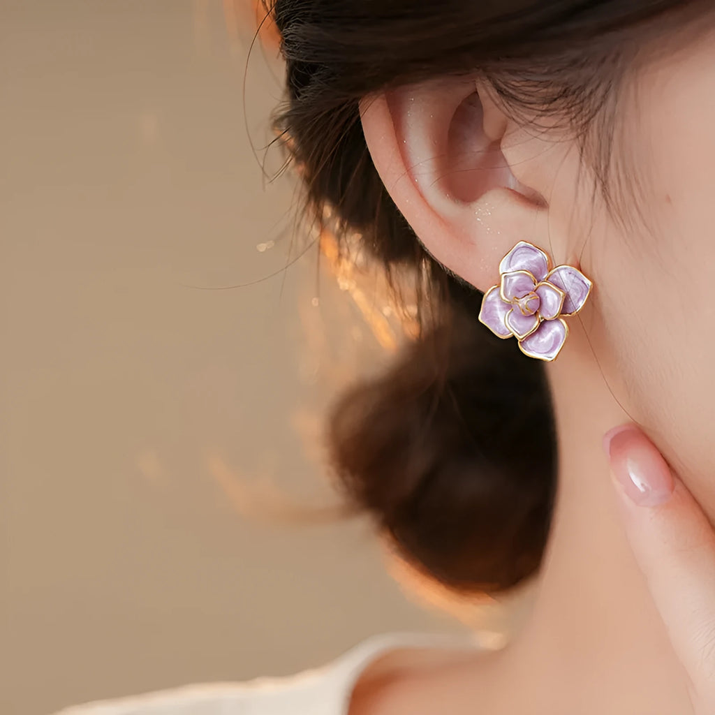 Gold plated purple oil-spot glaze flower stud earrings with copper construction and detailed floral design