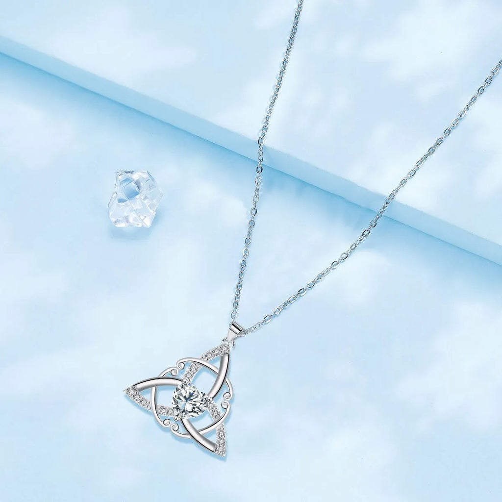 Copper Celtic knot pendant necklace in choice of electroplated colours: white, blue, green, or red.