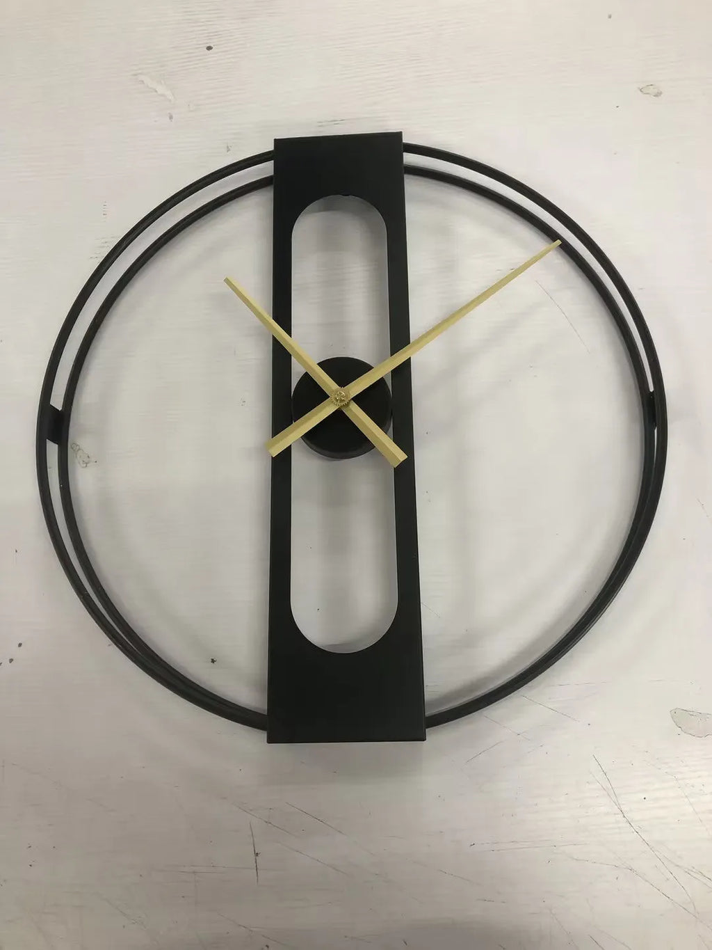 50cm round metal wall clock in gold or black finish with battery-powered operation