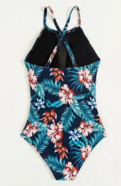 Women's deep V-neck one-piece swimsuit in a printed design, available in sizes S to XL.