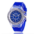 Women's LED luminous quartz watch with round 43mm alloy case and colourful silicone strap options.