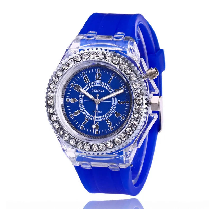 Women's LED luminous quartz watch with round 43mm alloy case and colourful silicone strap options.