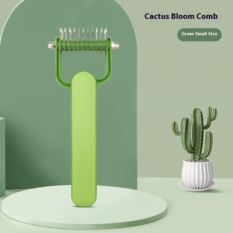 Green and grey pet hair unknotting comb with stainless steel teeth on PP handle