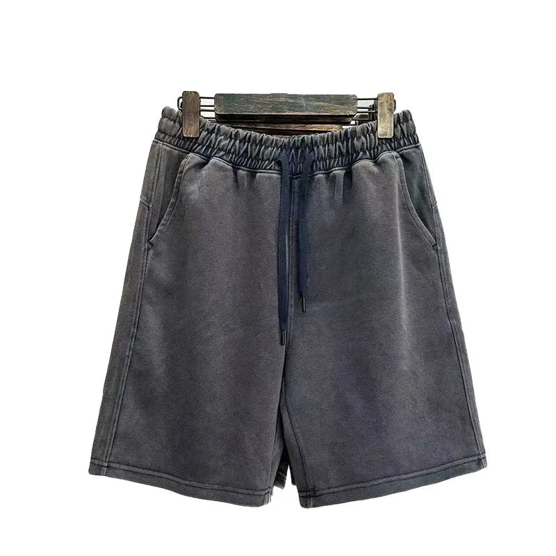 Men's cotton casual shorts with distressed detailing in straight-leg loose fit