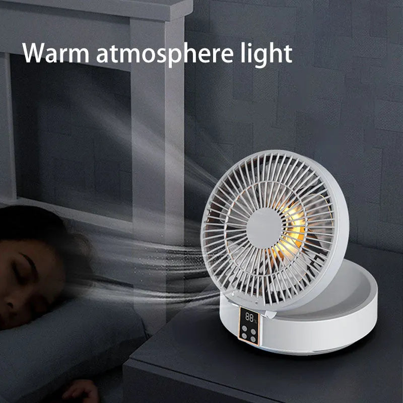 White USB rechargeable folding fan with remote control on a desk, showing 90° adjustable head and night light