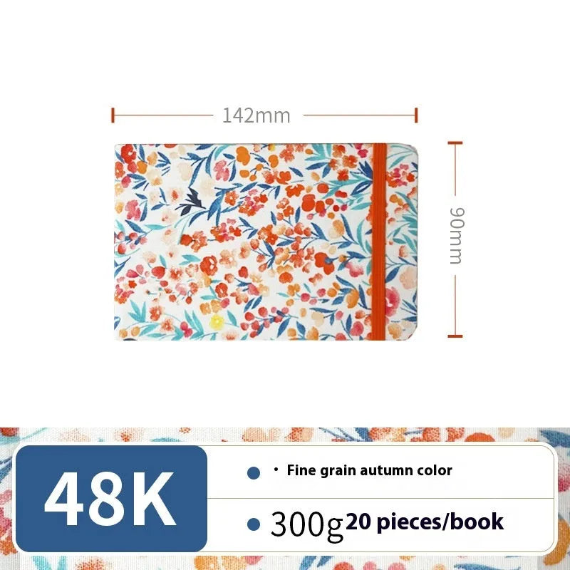 Feiluniao handmade fabric watercolour sketchbook with colourful themed cover, 185mm long.