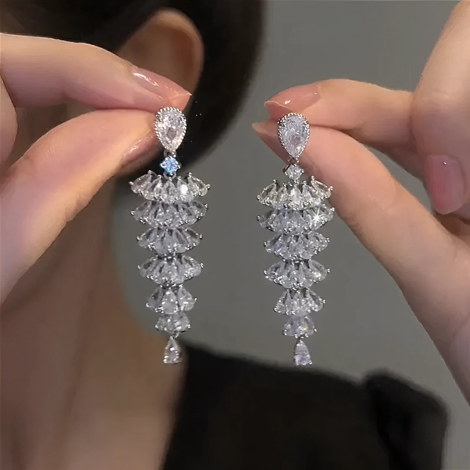 Silver pagoda Christmas tree drop earrings with sparkling zircon stones and stud fastening