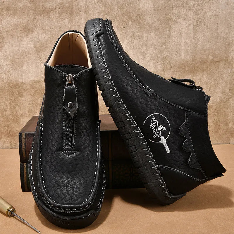 Men's slip-on leather loafers in black, brown, and grey colours showing round toe and rubber sole