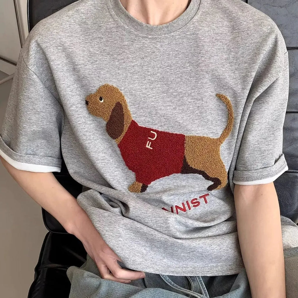 Grey men's t-shirt with embroidered sausage dog in a towel design on the front.