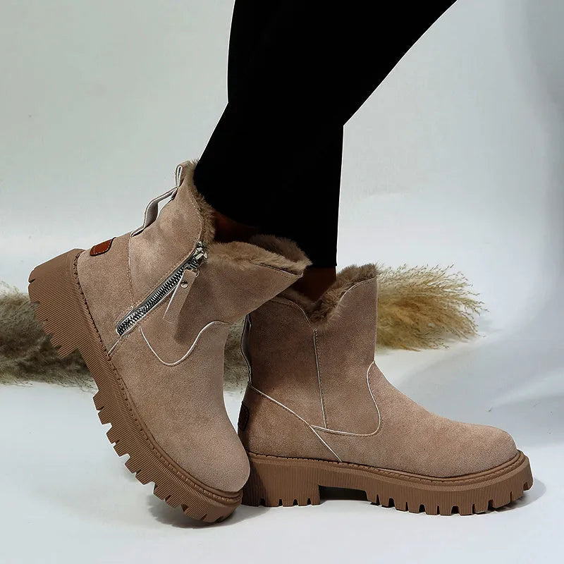 Women's black thick plush snow boot with side zip and faux fur lining