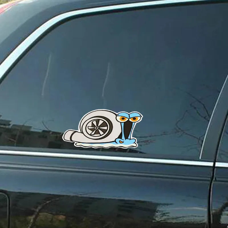 White cartoon snail reflective vinyl car sticker measuring 12 by 8 centimetres