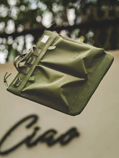 Marden Tooling charcoal black nylon canvas messenger bag with shoulder strap shown open.