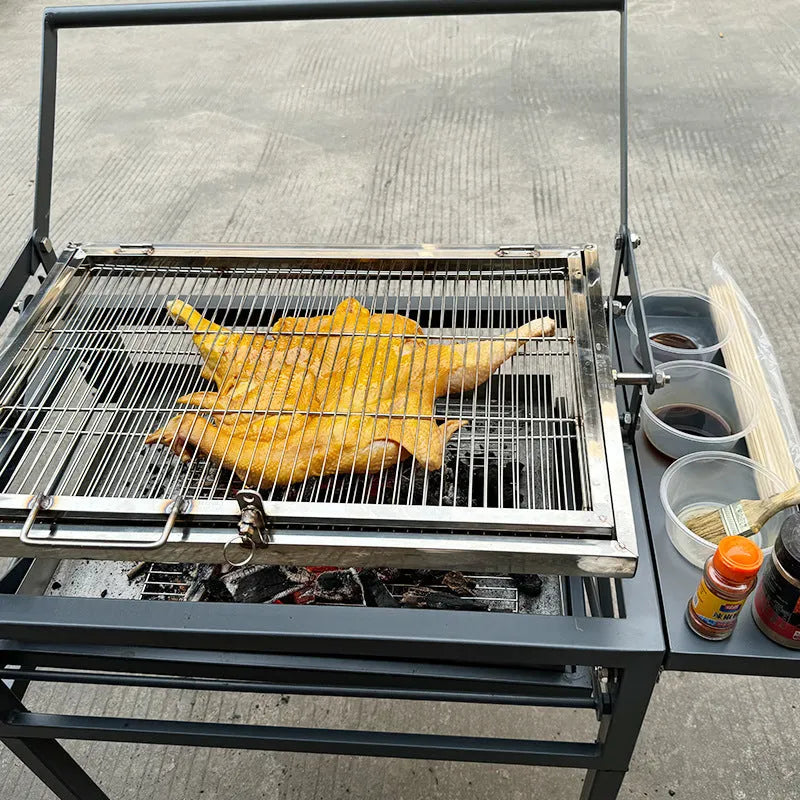 Large black portable charcoal barbecue grill with foldable detachable frame for outdoor cooking