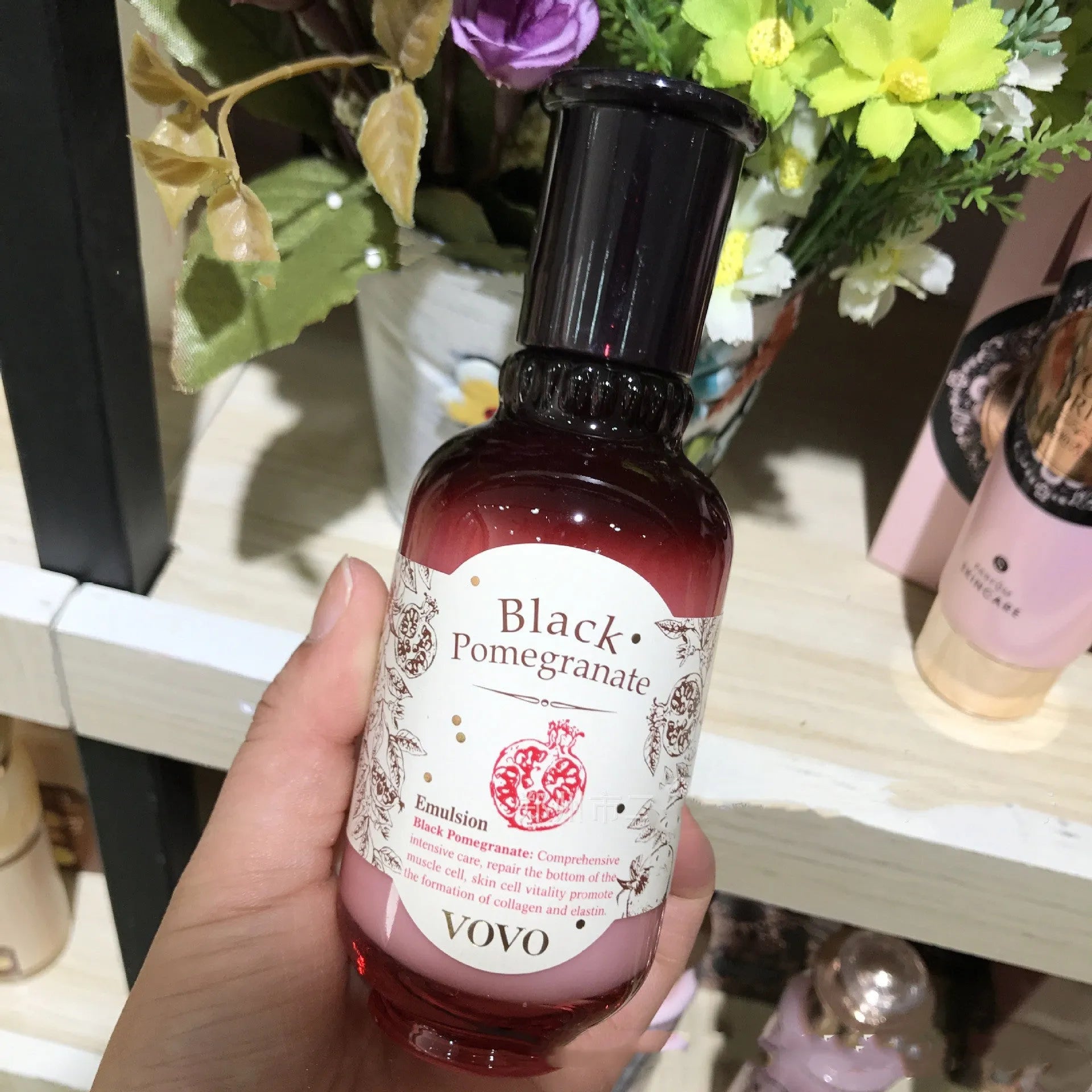 Pomegranate skincare six-product set showing cleanser, moisturising water, milk, essence, cream, and eye cream