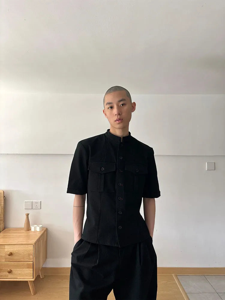 Handmade black half-sleeve hunting shirt with a shirt collar on a mannequin