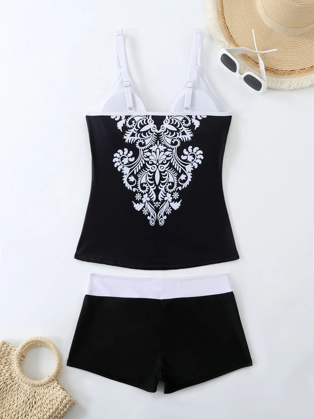 Women's plus size two-piece swimsuit in black or rose red with briefs style design