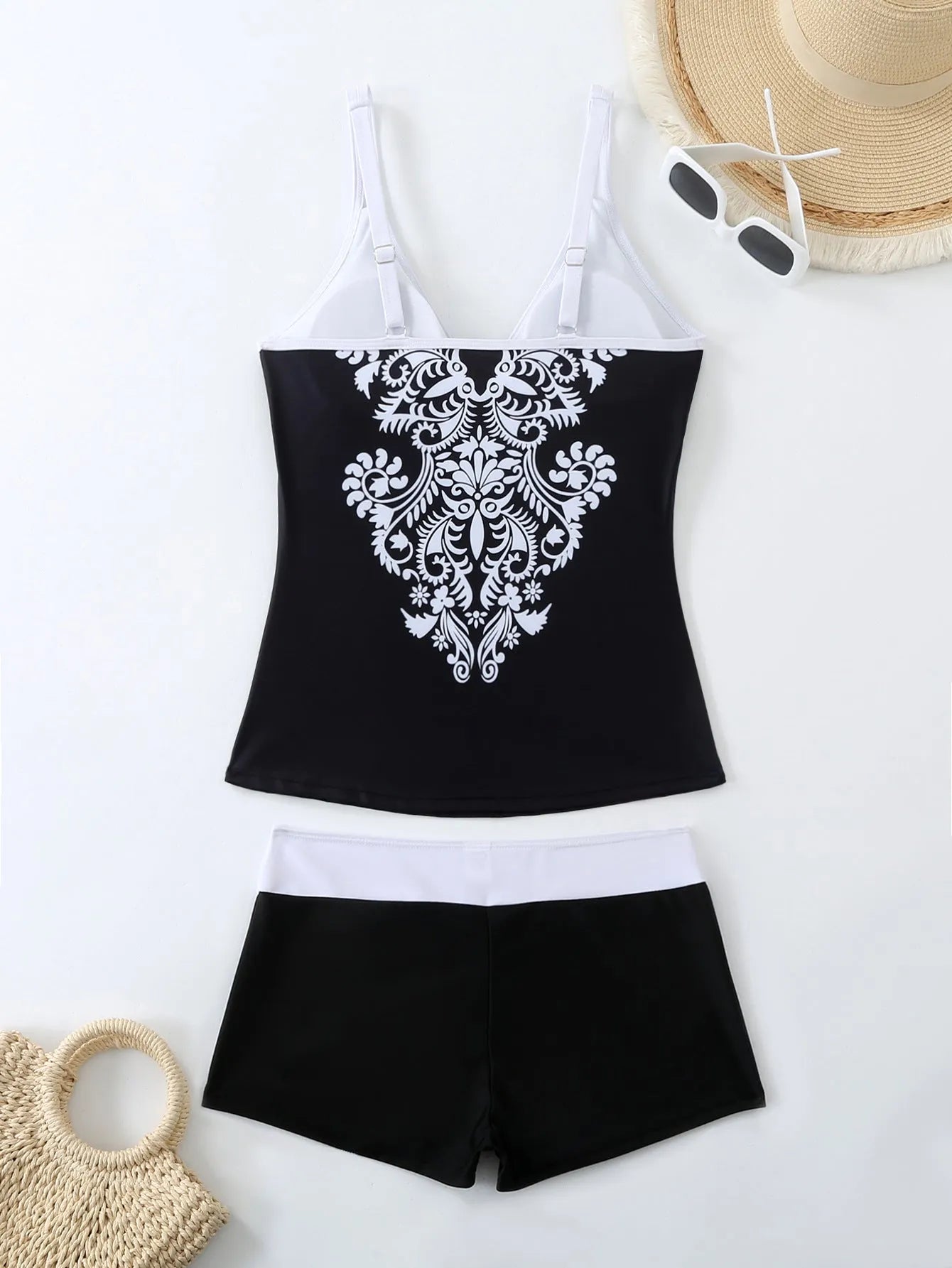 Women's plus size two-piece swimsuit in black or rose red with briefs style design