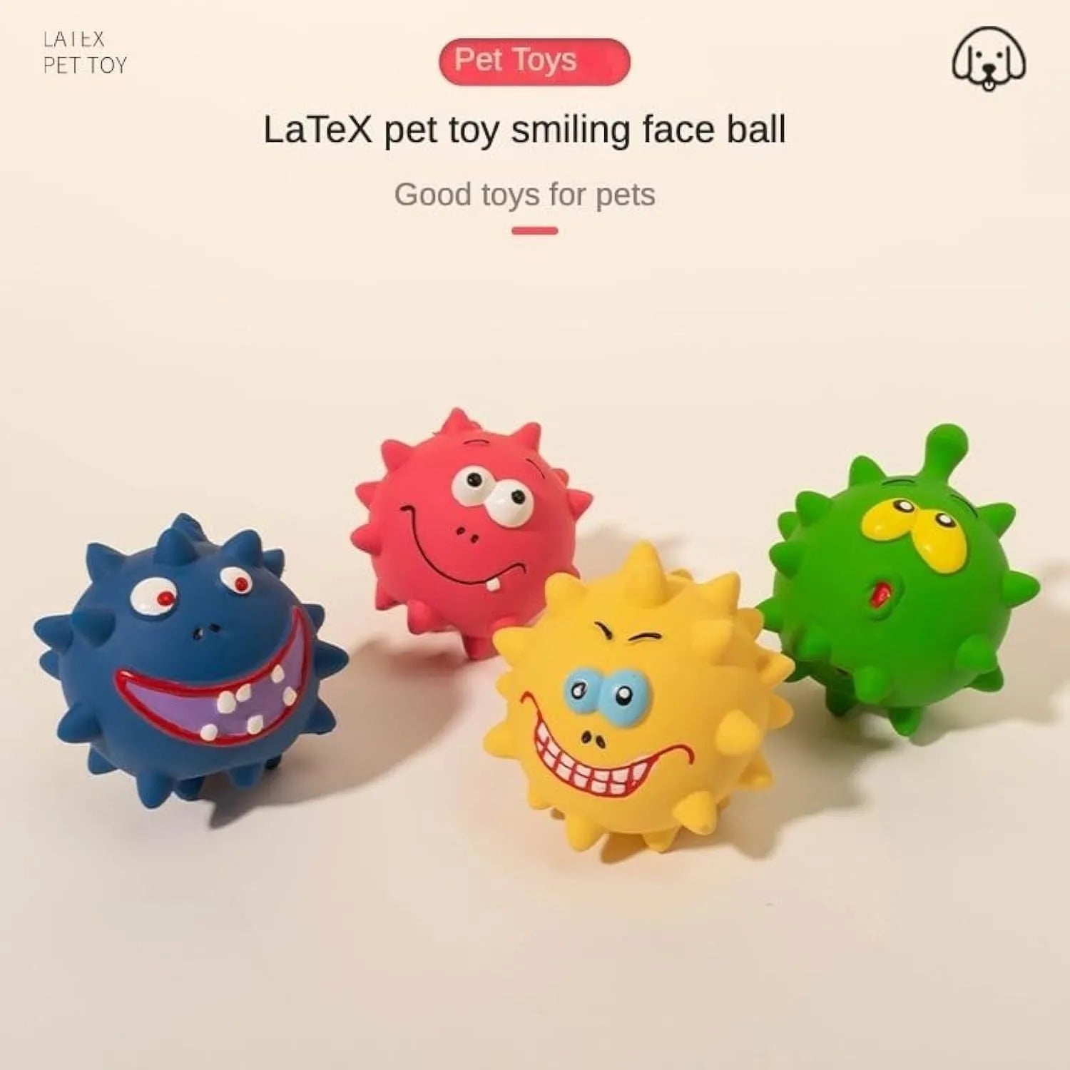 Four colourful squeaky dog balls with cute faces on natural latex rubber with bumpy dental-cleaning surface